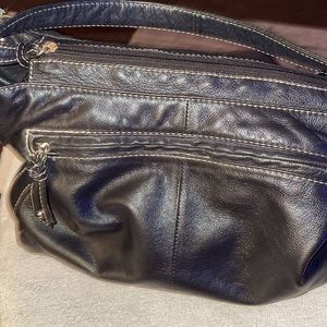 This is a really nice black leather purse very soft leather excellent condition